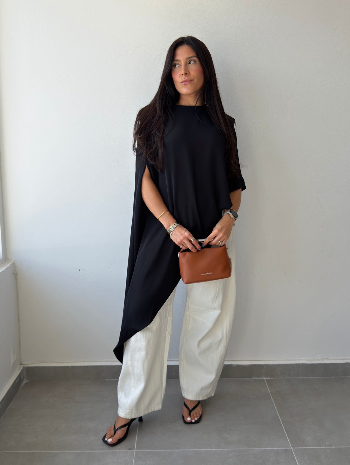 Black Asymmetric Cape