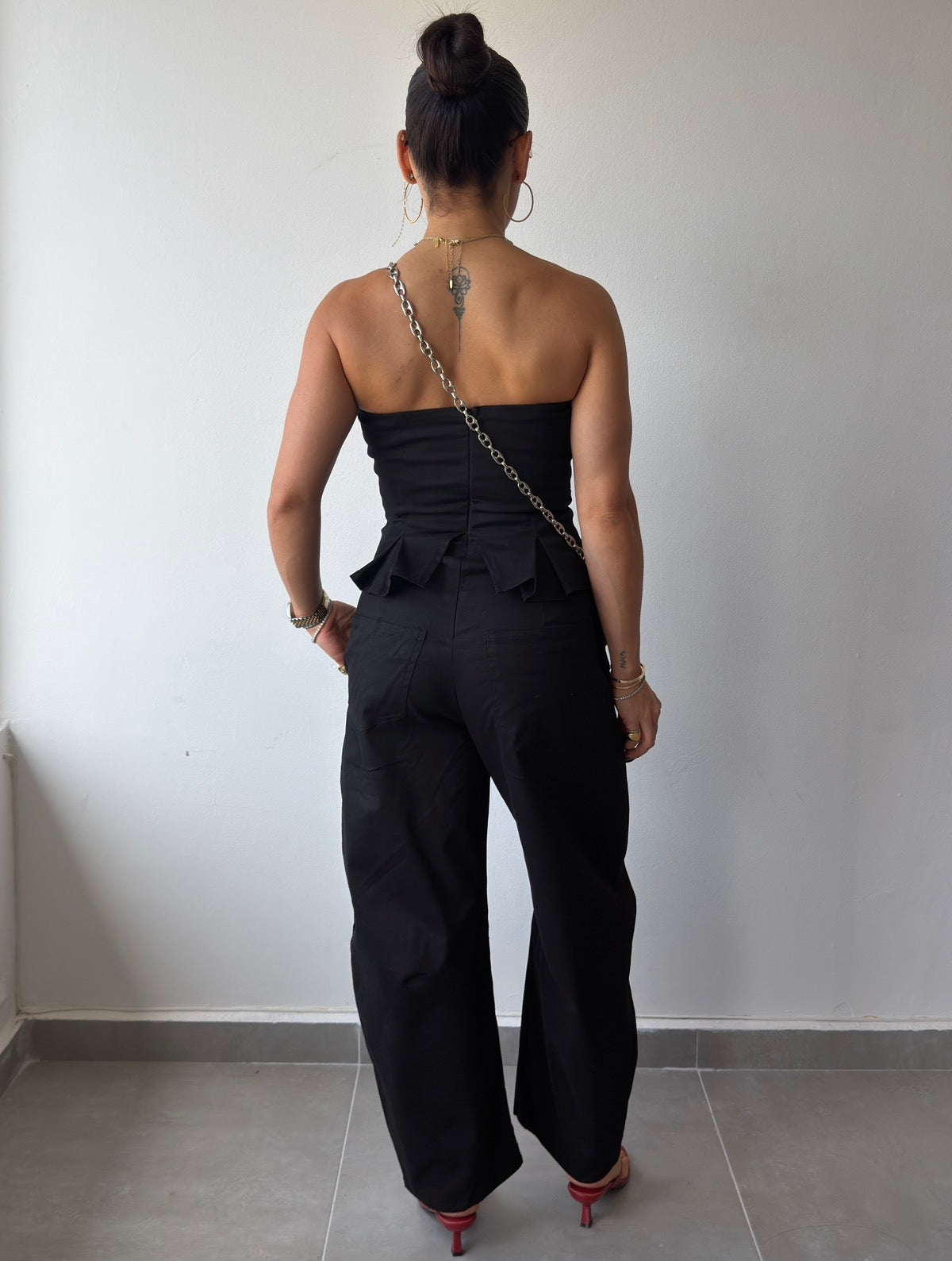 Black Peplum Barrel Jumpsuit